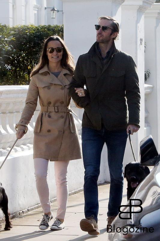 EXCLUSIVE ALL ROUNDER ***NO WEB WITHOUT APPROVAL FROM VANTAGE NEWS - NO SUBSCRIPTIONS*** Pippa Middleton and James Matthews take their dogs for a walk in the autumnal sunshine. The recently engaged couple looked completely loved-up as they shared a joke during their stroll through the streets of central London. 23 October 2016. Please byline: Vantagenews.com