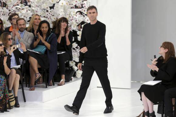 Belgian designer Raf Simons appears at the end of his Haute Couture Fall/Winter 2014-2015 fashion collection for French fashion house Christian Dior in Paris