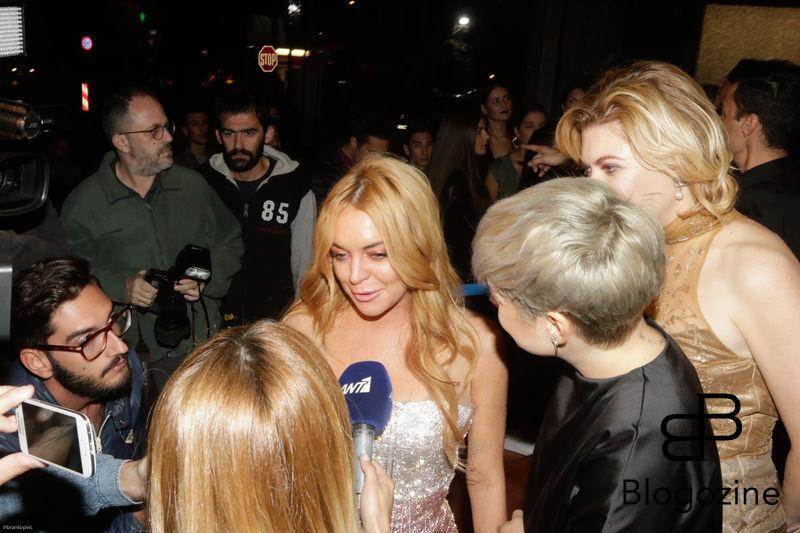 52204278 Lindsay Lohan attends the opening of her new club 'Lohan' in Greece on October 15, 2016. The grand opening featured people in LED lighted suits, classy dresses and Lindsay Lohan blowing kisses to the camera. The group appeared to be thoroughly enjoying their time out. At one point, Lindsay was being interviewed by a slew of reporters. FameFlynet, Inc - Beverly Hills, CA, USA - +1 (310) 505-9876 RESTRICTIONS APPLY: NO GREECE