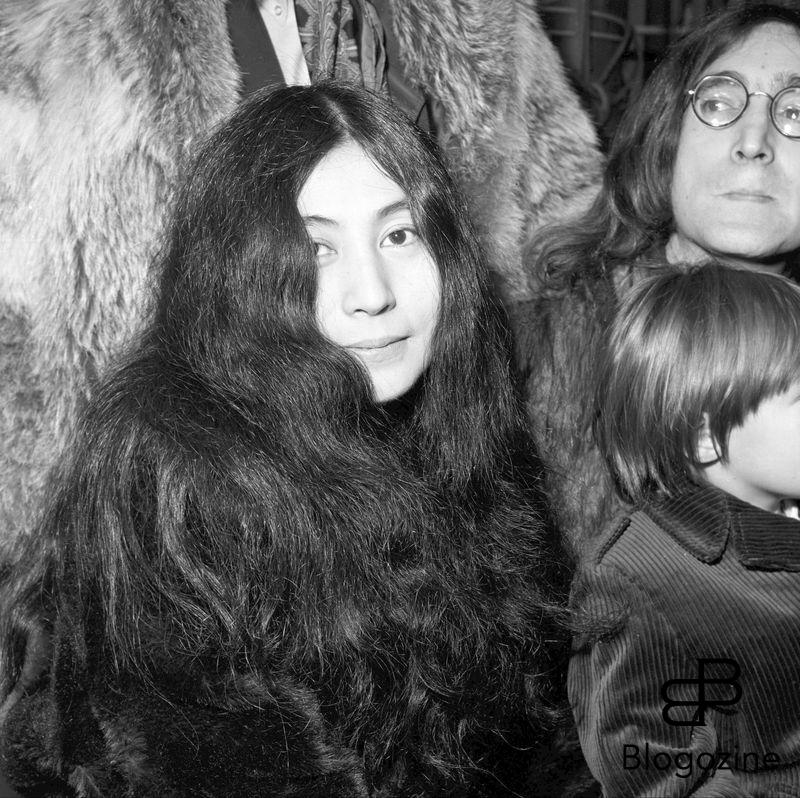 Yoko Ono , japanese actress , John Lennon in background Ref: PGH170789 Date: 10.12.1968 COMPULSORY CREDIT: Starstock/Photoshot 9th November 1966 - John Lennon and Yoko Ono meet for the first time at her exhibition at the Indica Gallery in London. Lennon remembered the date of their meeting as the 9th but many Beatles historians contend that it actually happened on the 7th, the day before the exhibition opened.